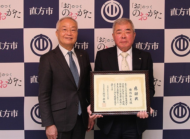 棟形さん（写真左）